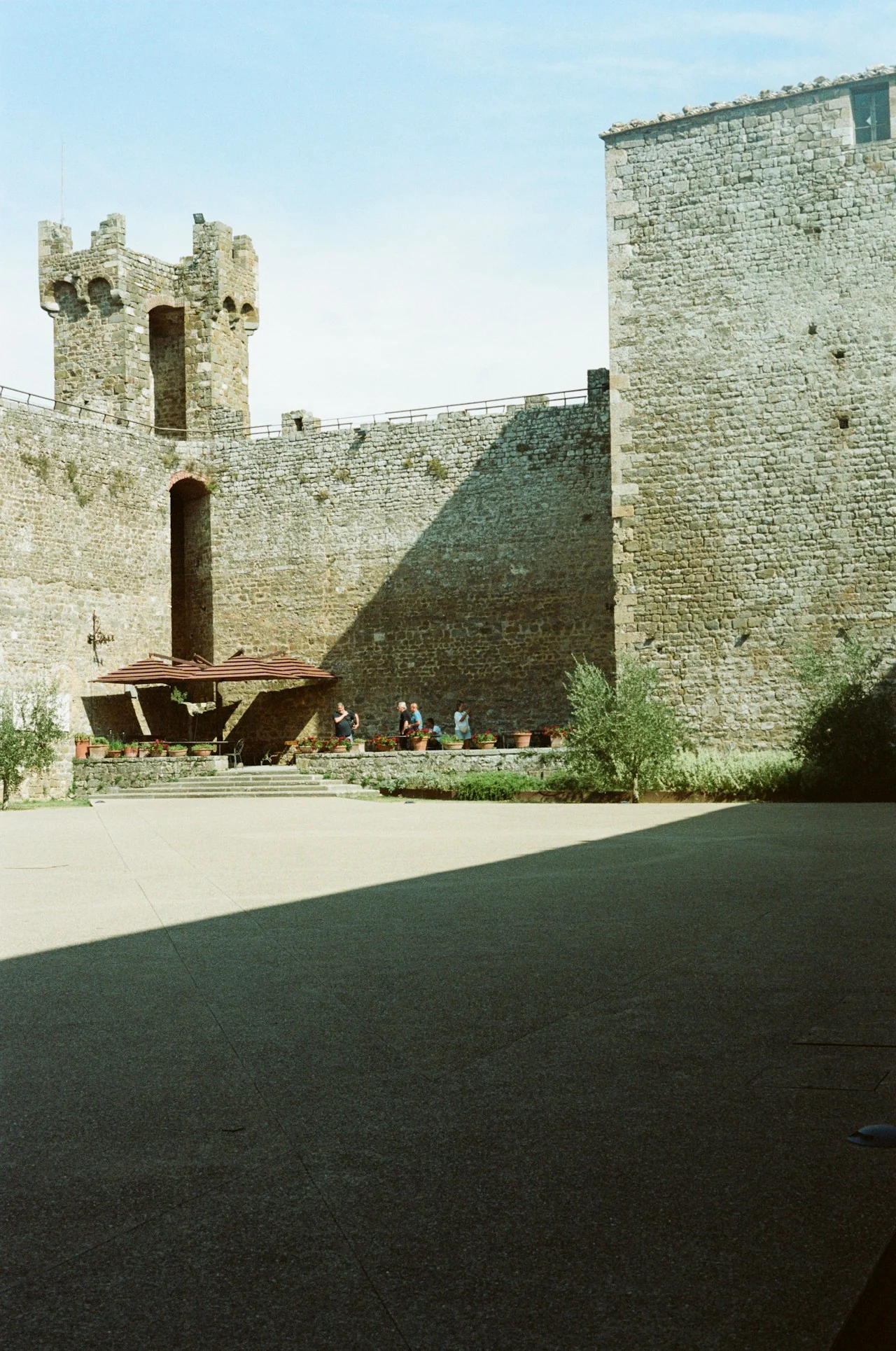 Stone walls and towers around the courtyard of Montalcino’s fortress